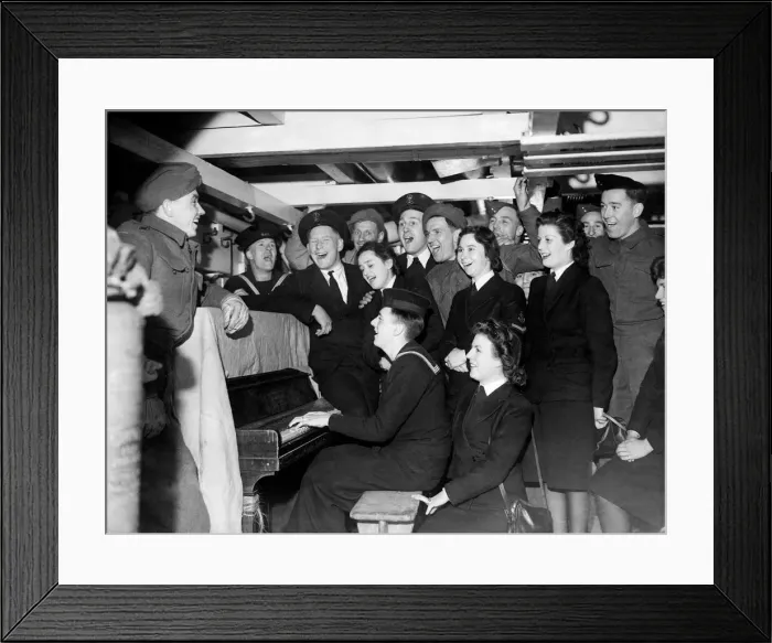 Framed Print : Sailors and soldiers having a sing-song on a British Troopship. 27th February 1944 Framed Print : Sailors and soldiers having a sing-song on a British Troopship. 27th February 1944