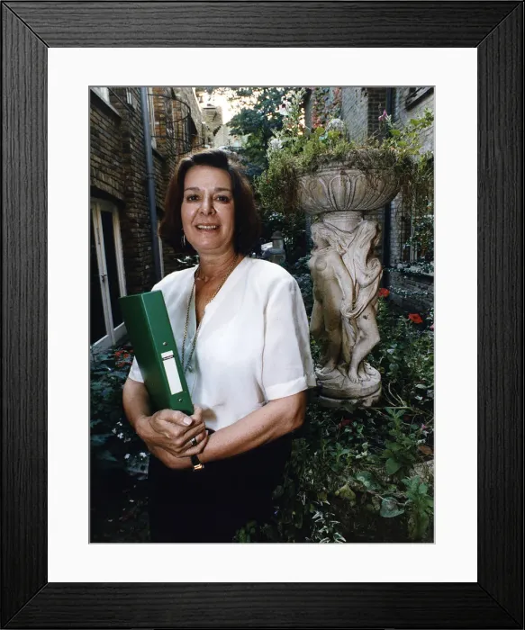 Framed Print : Verity Lambert TV Producer for BBC TV soap opera Eldorado stands in yard with Framed Print : Verity Lambert TV Producer for BBC TV soap opera Eldorado stands in yard with