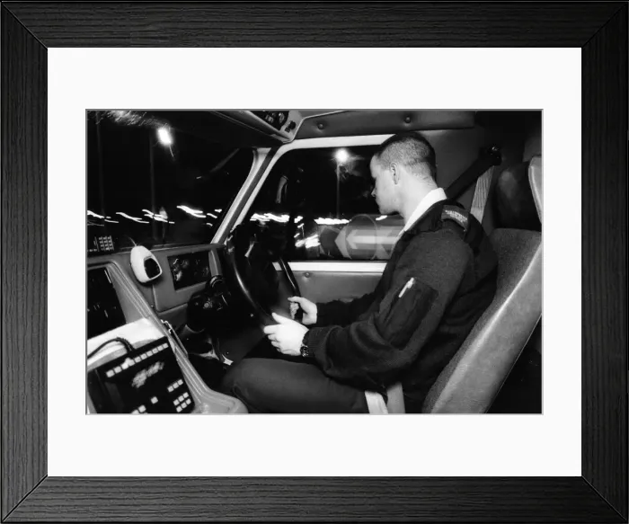 Framed Print : A paramedic drives his ambulance to the next emergency Framed Print : A paramedic drives his ambulance to the next emergency