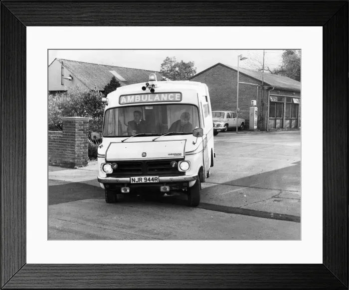 Framed Print : An ambulance speeds to an emergency call-out Framed Print : An ambulance speeds to an emergency call-out