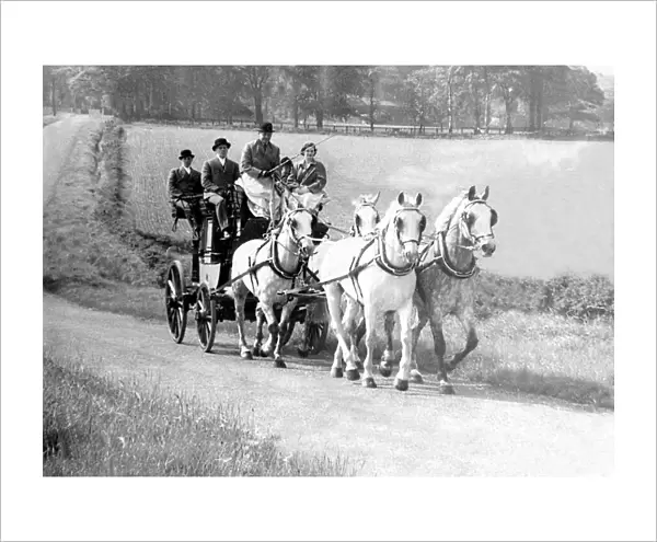 The Venture coach on the road between Shotley Bridge and Blanchland, with, right