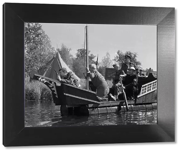 The cast of the wartime comedy series Dads Army take to the water during the filming of