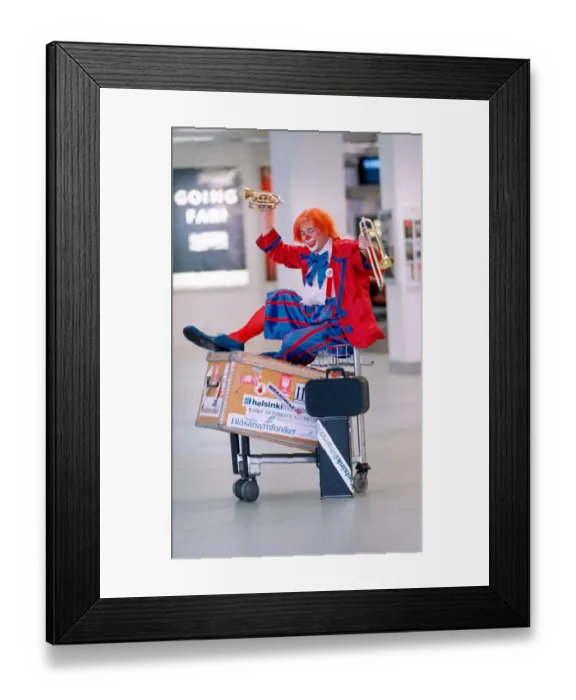 Framed Print : Norwegian musical clown Melvix Tix at Newcastle Airport Framed Print : Norwegian musical clown Melvix Tix at Newcastle Airport