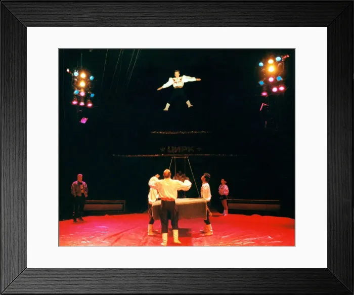 Framed Print : Circus performers practicing before the crowds come in