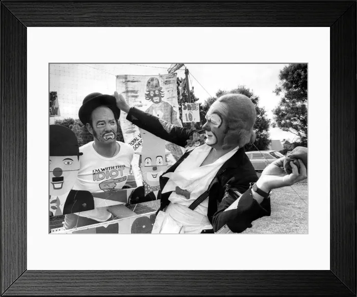 Framed Print : Clown brothers Geoff and Don Atha fooling around on a knock em off'stall Framed Print : Clown brothers Geoff and Don Atha fooling around on a knock em off'stall