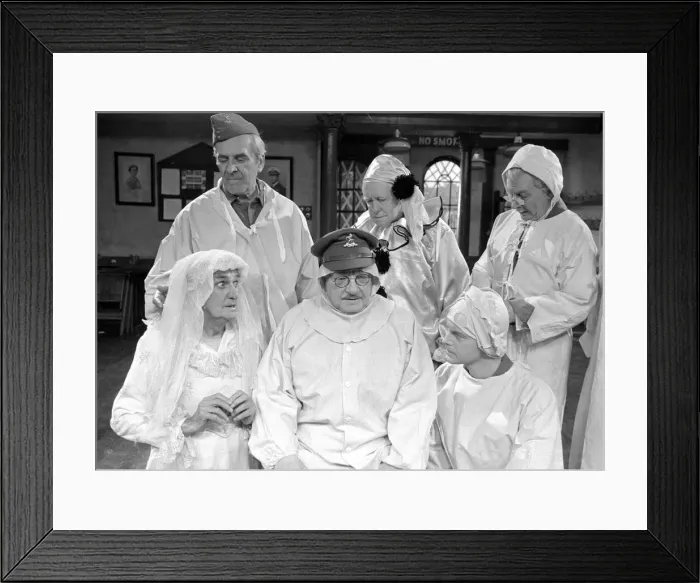 Framed Print : Members of the cast of the popular television comedy series Dads Army appear in a special Framed Print : Members of the cast of the popular television comedy series Dads Army appear in a special