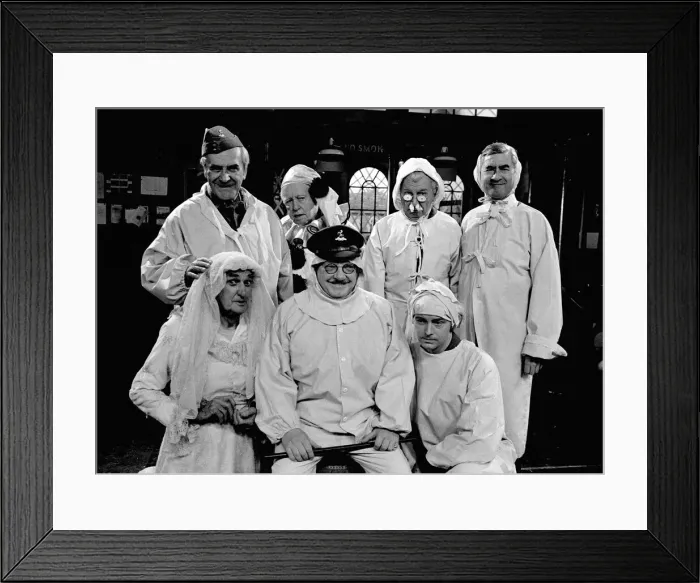 Framed Print : Members of the cast of the popular television comedy series Dads Army appear in a special