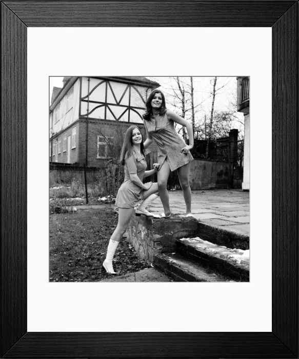 Framed Print : The two Michelle sisters of Chigwell, Essex come into view on the television screens Framed Print : The two Michelle sisters of Chigwell, Essex come into view on the television screens