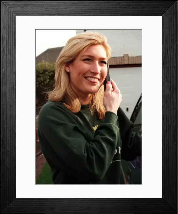 Framed Print : Ali Paton Gladiator Siren February 1999 using mobile phone