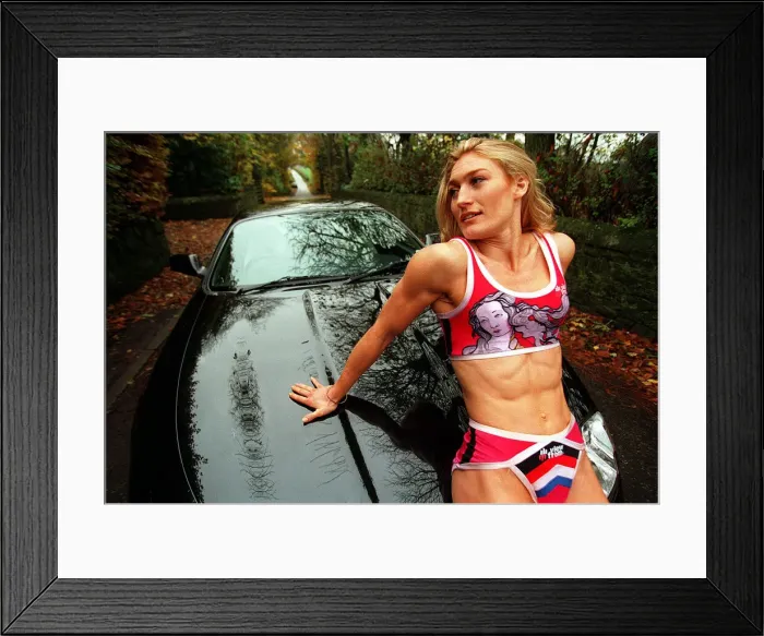 Framed Print : Gladiator Siren - impressed with the new Jaguar XK8 bonnet Framed Print : Gladiator Siren - impressed with the new Jaguar XK8 bonnet