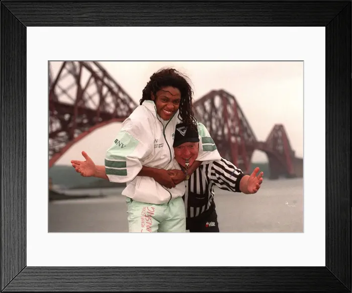 Framed Print : Gladiator Rocket ( Pauline Richards) gets a head lock on referee John Anderson with Framed Print : Gladiator Rocket ( Pauline Richards) gets a head lock on referee John Anderson with