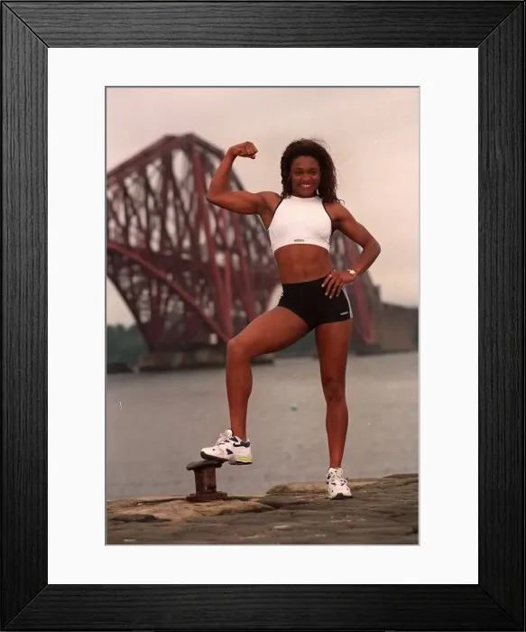 Framed Print : Gladiator Rocket (Pauline Richards) showing her muscles with the Forth railway bridge in Framed Print : Gladiator Rocket (Pauline Richards) showing her muscles with the Forth railway bridge in