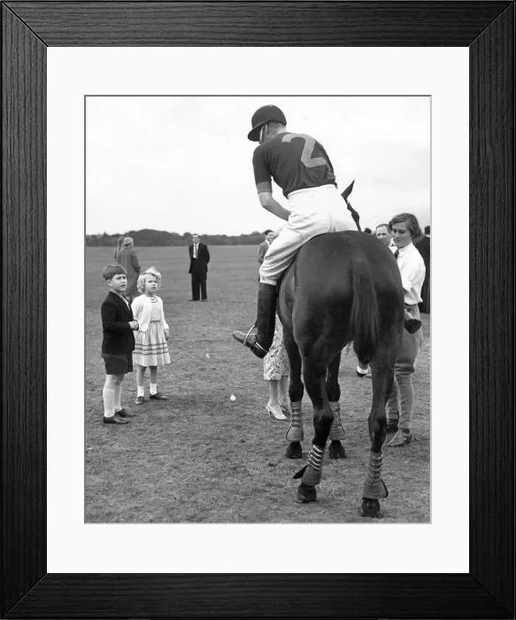 Framed Print : Prince Philip, Duke of Edinburgh, takes a break from the polo match to chat with his son