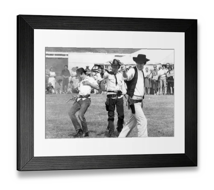 Framed Print : Gun totting outlaws drew a big crowd at a country music festival in South Shields