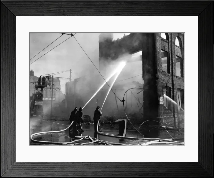Framed Print : Firefighters batlle to contain the fire at the Appletons warehouse buildings on New