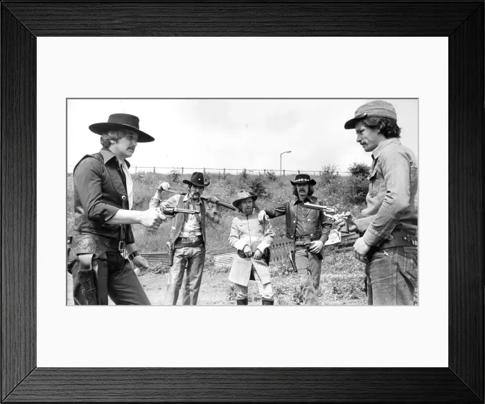 Framed Print : Members of the Hedwoth Gun Fighters Club line-up ready for action Framed Print : Members of the Hedwoth Gun Fighters Club line-up ready for action