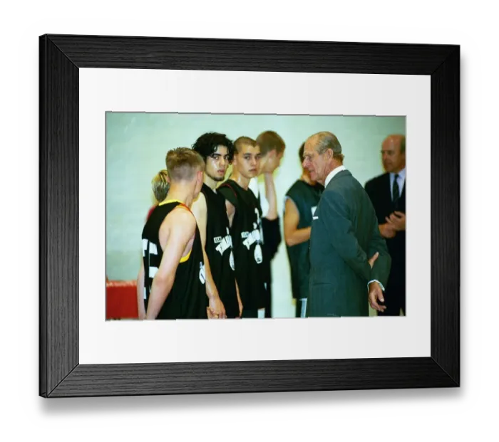 Framed Print : Prince Philip, Duke of Edinburgh, chats to the basketball players at the Washington Framed Print : Prince Philip, Duke of Edinburgh, chats to the basketball players at the Washington