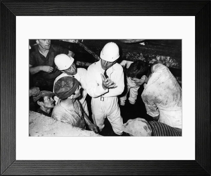 Framed Print : Prince Philip, Duke of Edinburgh, chats to a group of workers on his visit to the tunnel
