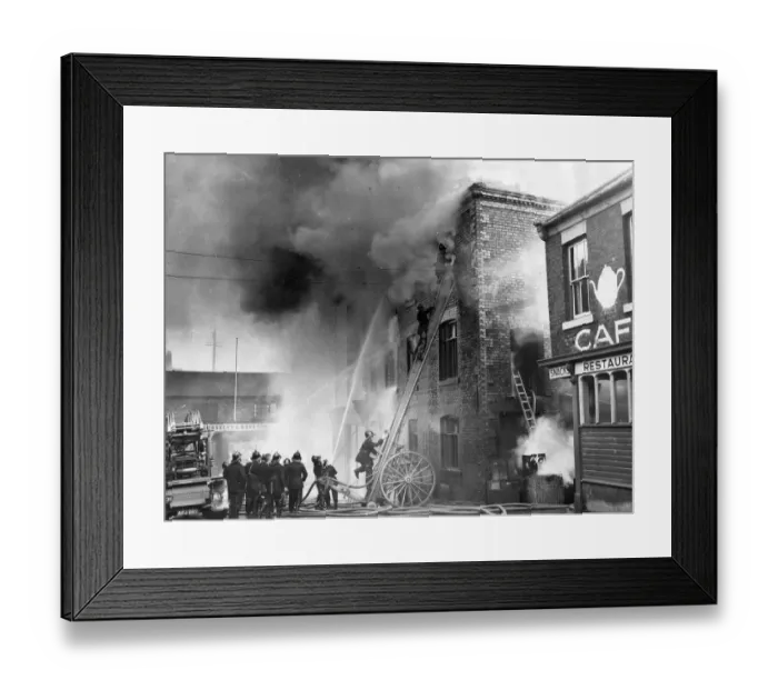 Framed Print : Firefighters fight to contain the fire in a three-storey chemical warehouse at Bridge