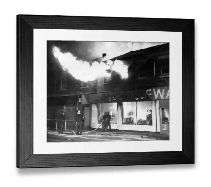 Framed Print : Firefighters fight to contain a fire at a Gateshead Furniture store and warehouse