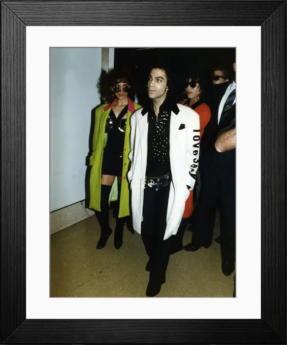Framed Print : Prince Pop Star with backing singer Sheila E at Heathrow Airport Framed Print : Prince Pop Star with backing singer Sheila E at Heathrow Airport