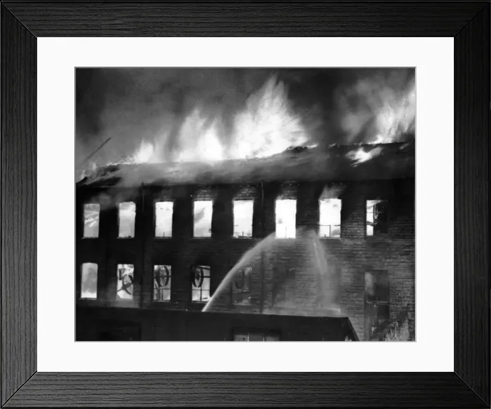 Framed Print : Flames leap from the roof of the mill during the height of the fire at Keighley, Bradford