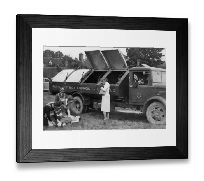 Framed Print : Volunteer ambulance drivers wearing gas masks as they practice attending to a Framed Print : Volunteer ambulance drivers wearing gas masks as they practice attending to a