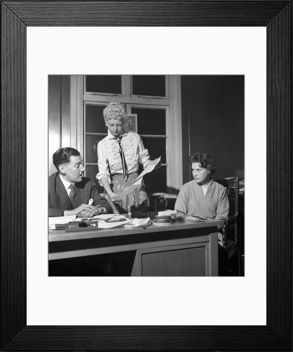 Framed Print : General office scene: Secretary taking notes and answering the phone in a Birmingham Framed Print : General office scene: Secretary taking notes and answering the phone in a Birmingham