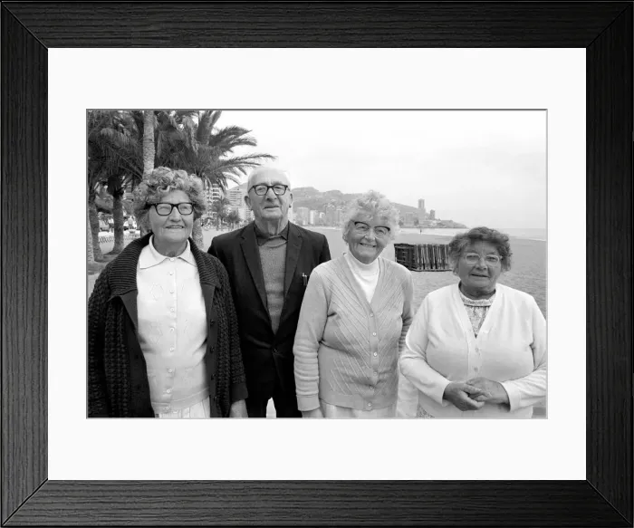 Framed Print : Old People: Holidays: Pensioners enjoying themselves on holiday abroad in Benidorm, Spain Framed Print : Old People: Holidays: Pensioners enjoying themselves on holiday abroad in Benidorm, Spain