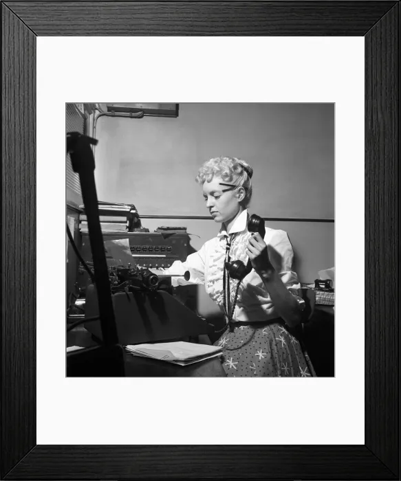 Framed Print : General office scene: Secretary taking notes and answering the phone in a Birmingham