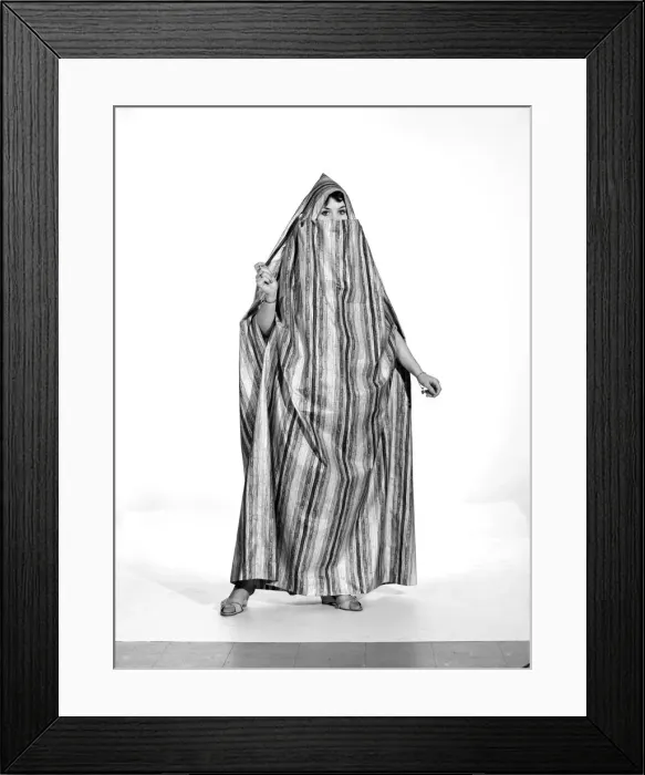 Framed Print : Clothing: Fashion: Beachwear: Woman wearing beach dress. 1963