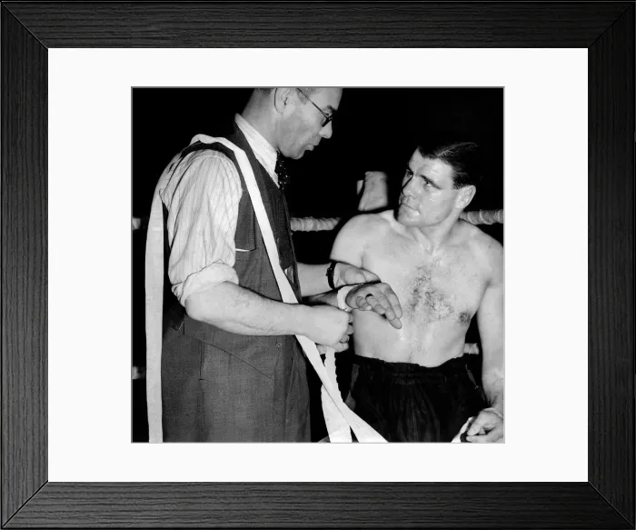 Framed Print : Nat sellars bandaging Vince Hawkins. November 1946 P009909 Framed Print : Nat sellars bandaging Vince Hawkins. November 1946 P009909