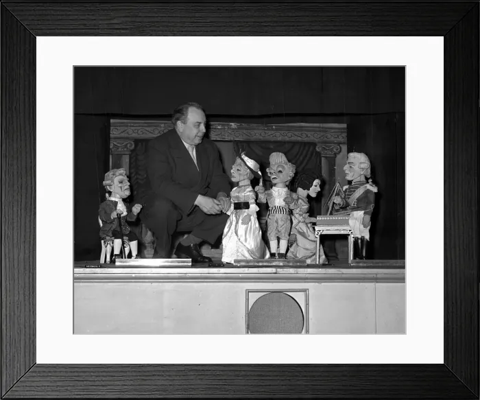 Framed Print : Author and broadcaster JB Priestley seen here at Londons Puppet theatre Framed Print : Author and broadcaster JB Priestley seen here at Londons Puppet theatre