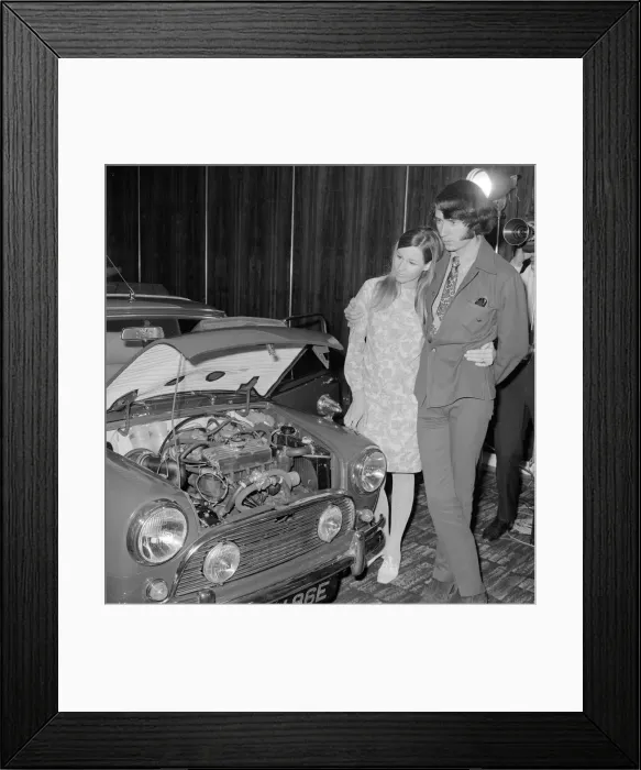 Framed Print : Mike Mesmith of the American pop group The Monkees with his wife as their newly purchased