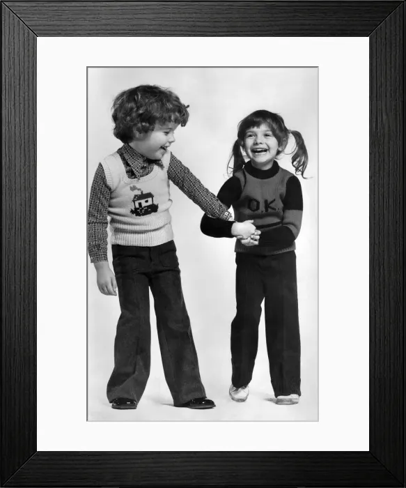 Framed Print : Clothing: Children: Latest casual fashions for children modelled by Steven and Tamara Framed Print : Clothing: Children: Latest casual fashions for children modelled by Steven and Tamara