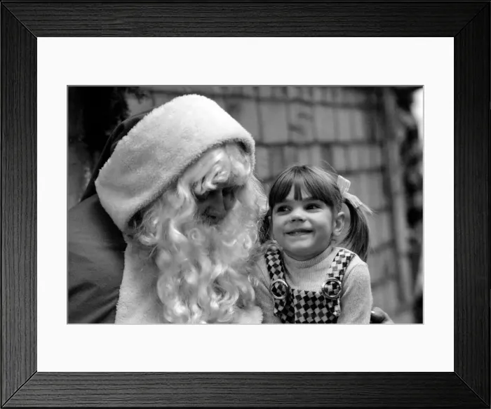 Framed Print : Father Christmas talks to children in a Manchester store. December 1971 71-12035-008 Framed Print : Father Christmas talks to children in a Manchester store. December 1971 71-12035-008