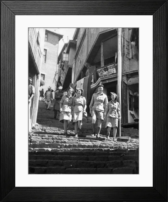 Framed Print : A British army soldiers of the 14th Army walks around the town of Simla in India with
