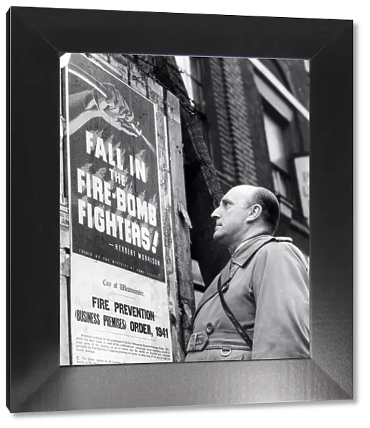 How to join the firefighters. Man looking at poster encouraging men to recruit