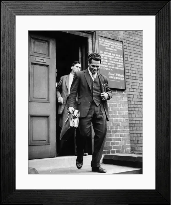 Framed Print : Kitione Lave smiles as he leaves the court. I need the money, he pleaded Framed Print : Kitione Lave smiles as he leaves the court. I need the money, he pleaded