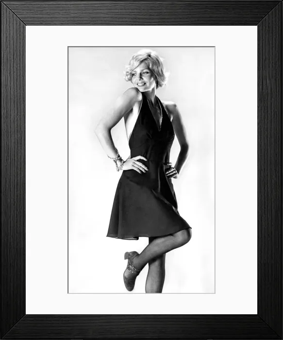 Framed Print : The halter neckline plunges deep at the front, and the top is outlined with diamante Framed Print : The halter neckline plunges deep at the front, and the top is outlined with diamante