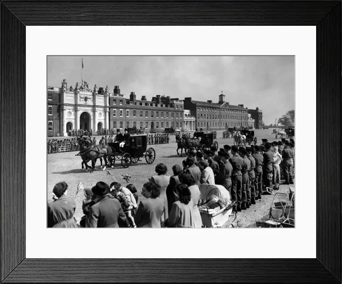 Framed Print : Woolwich: General view showing horses walking between ranks of cheering troops Framed Print : Woolwich: General view showing horses walking between ranks of cheering troops