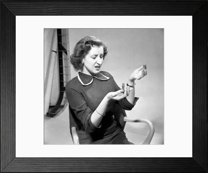 Framed Print : Woman with lipstick refil. November 1952 D6882-1 Framed Print : Woman with lipstick refil. November 1952 D6882-1