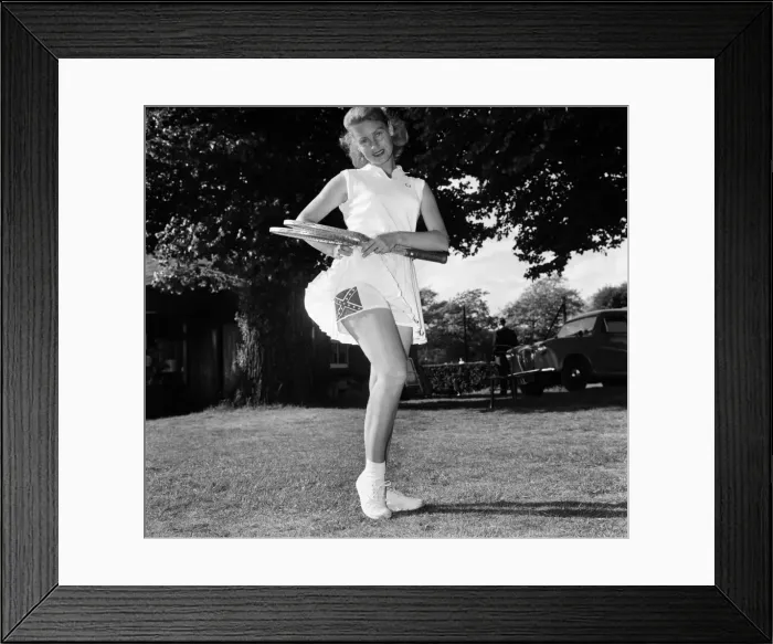 Framed Print : Lawn Tennis at Beckenham. Woman holding a tennis racket wearing a sports dress