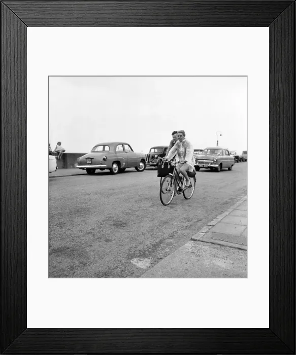 Framed Print : Holidaymakers riding along the sea front at Haylake Devon. June 1960 M4313-007 Framed Print : Holidaymakers riding along the sea front at Haylake Devon. June 1960 M4313-007
