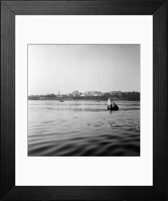 Framed Print : Looking from sea towards Bournemouth with buoy marking sewerage outlet in foreground Framed Print : Looking from sea towards Bournemouth with buoy marking sewerage outlet in foreground