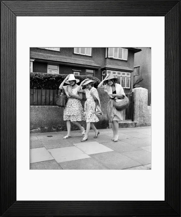 Framed Print : Three women hold on to their hats on the seafront at Haylake. June 1960 M4313-003 Framed Print : Three women hold on to their hats on the seafront at Haylake. June 1960 M4313-003