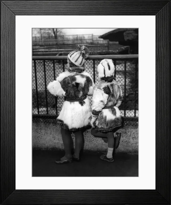 Framed Print : Fashion. Never mind the weather. Here are two young visitors to London who couldn Framed Print : Fashion. Never mind the weather. Here are two young visitors to London who couldn