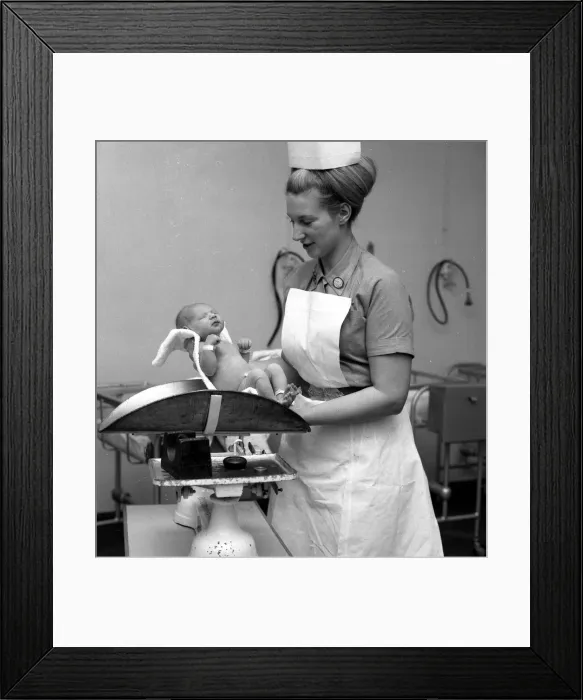 Framed Print : Nurse Anne Stewart with first new born babies of the year at Queen Charlotte