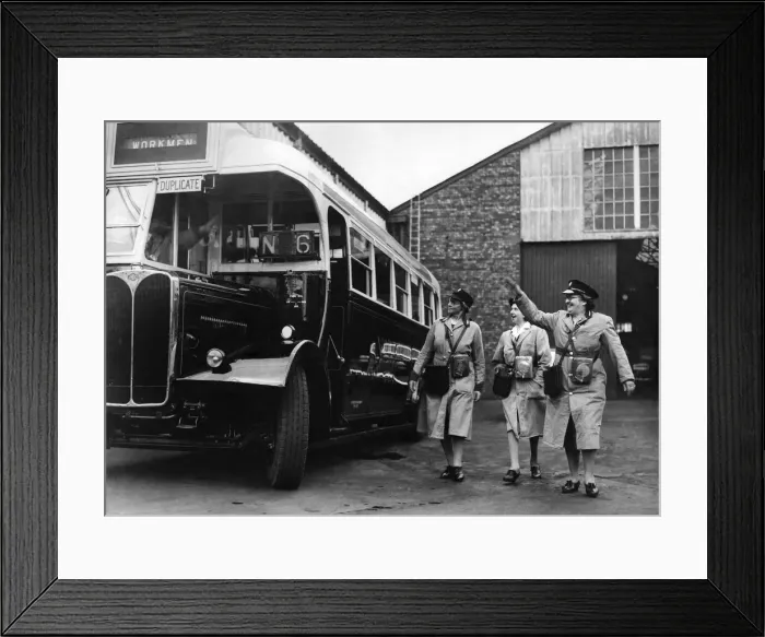 Framed Print : World War II Women: Women conductress arrive for work at a Northern English town bus