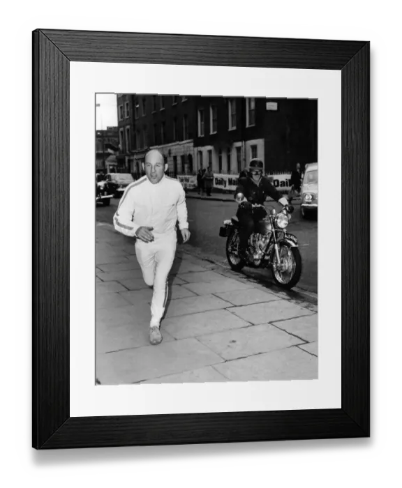 Framed Print : Daily Mail Transatlantic Air Race Racing driver Stirling Moss sprints across Framed Print : Daily Mail Transatlantic Air Race Racing driver Stirling Moss sprints across